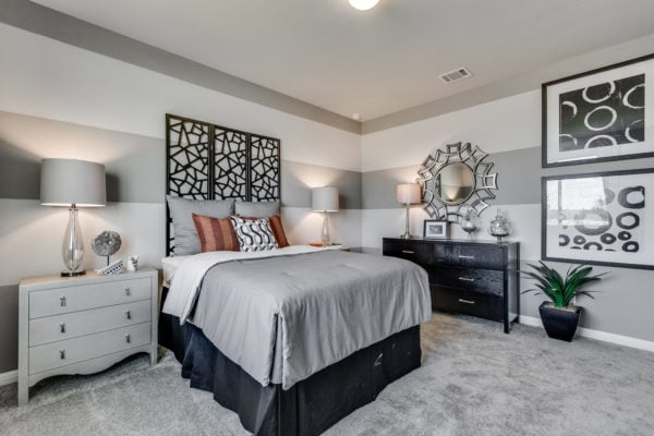 mix all shades of grey and black art installations to create an eclectic and expressive bedroom