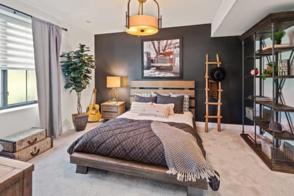 play with wood textures and personal mementos for a playful black and grey bedroom