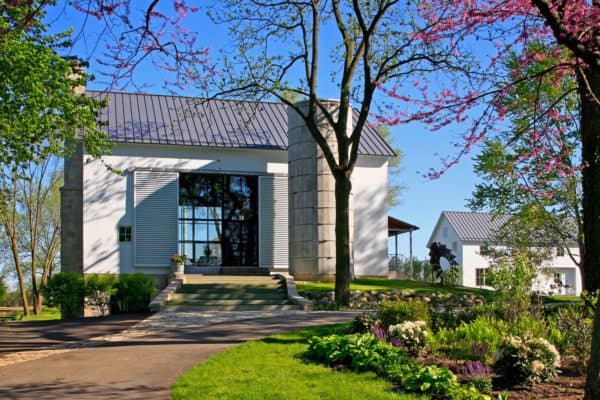 preserve the charms of an old barn with fresh paint and window shutters