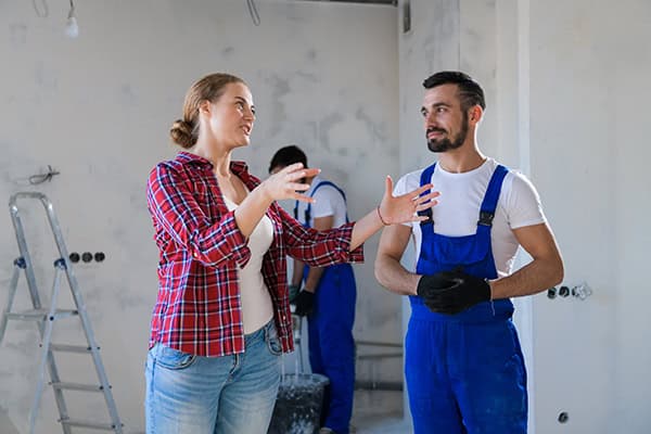 builder and client discussing home building work