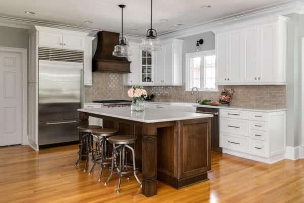 combine white kitchen set with wood textures and stainless appliances for warm ambiance