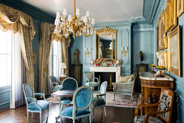 ornate blue furniture and antique gold chandeliers in your living room for history lovers