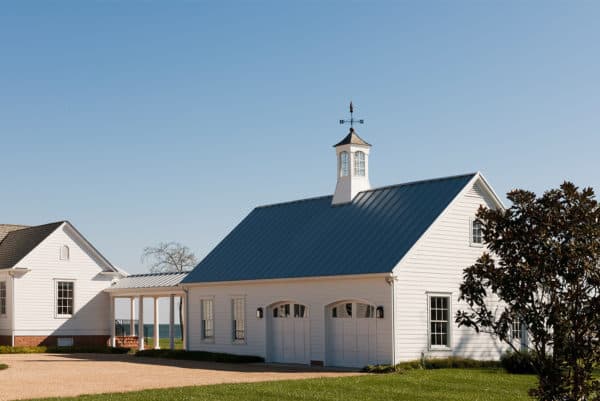 build a cottage-inspired home with a detached garage, breezeway, and charming cupola