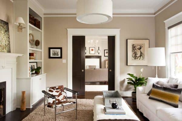 sealskin by sherwin-william make for gorgeous black doors amid white trim and beige walls