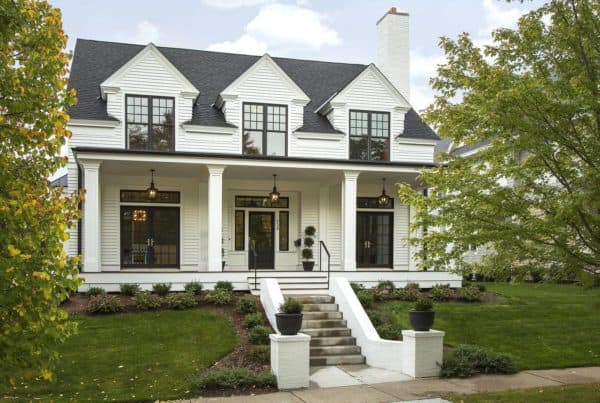 modern colonial white house and huge elegant black windows