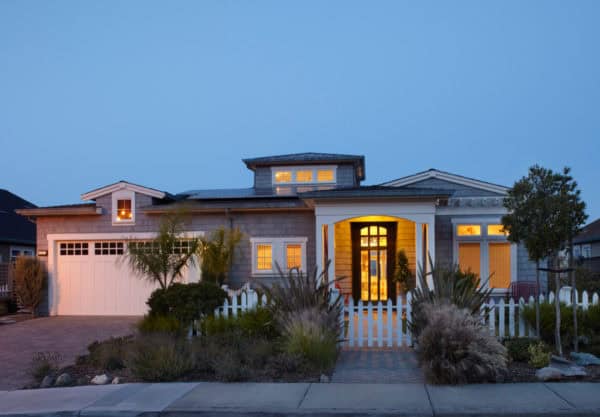 go large with the roof over front door and use picket fence for a private entryway