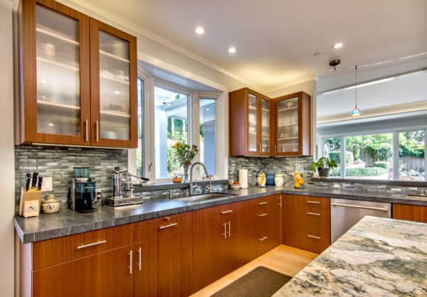 go for prairie-style interior with this kitchen bay window over the sink and sapele wood cabinets