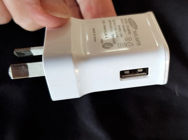 USB adapter that fits into your power socket and allows you to plug any USB connector into it