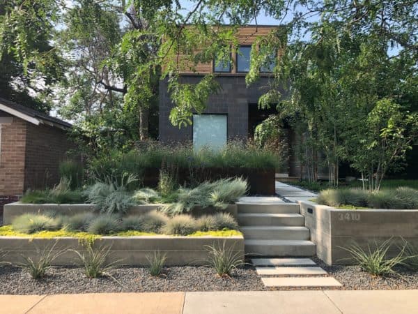 try a simple front yard retaining wall for a contemporary house exterior