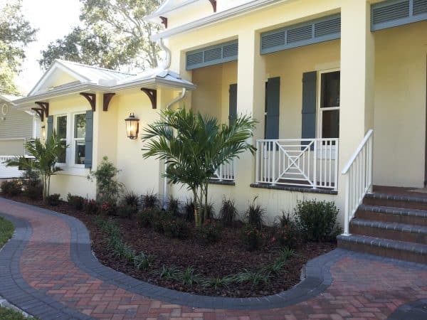 go for a yellow house with wedgewood blue shutters and white railings for a classic southern style