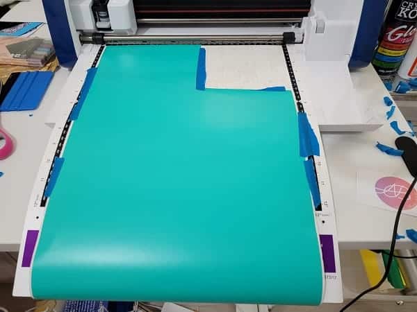 Shows a longer length of vinyl than the mat on a SDX Scan N Cut - tricky hack to save vinyl