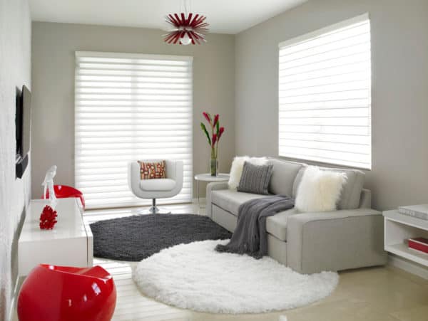 complement clean lines with different textures for a voguish red, white, and gray living room