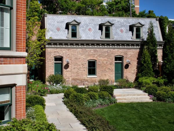 the best traditional italian style red brick house featuring beautiful grayish blue tile roof color