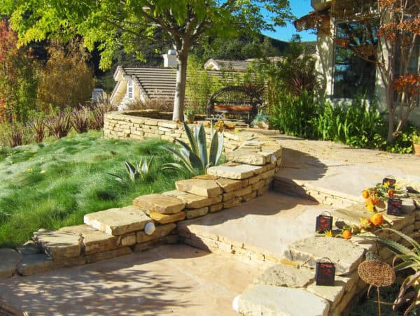 go back to classic with this traditional rustic landscaping and beautiful front yard retaining wall