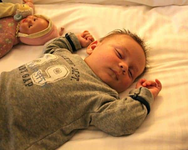 Traveling with a Newborn Sleeping on Hotel Bed