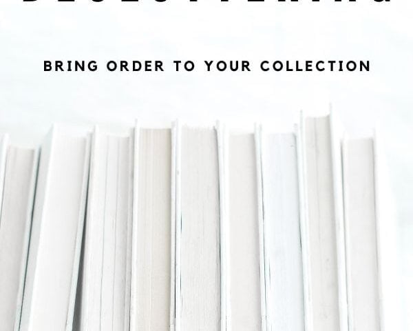 white books with no dust cover and interior page edges showing against white background