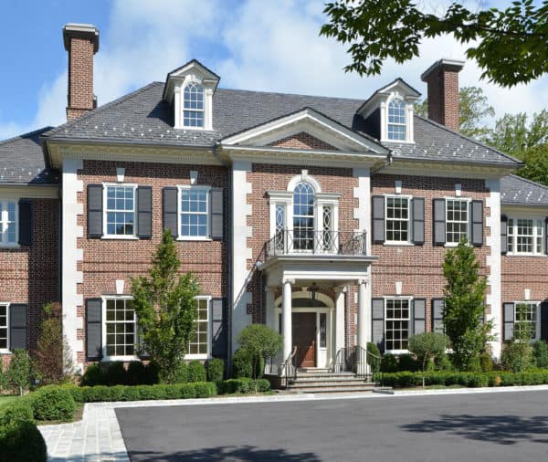 unfading gray color slate roof looks gorgeous on a classic georgian red brick house