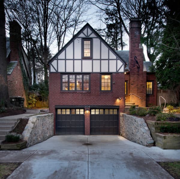 embellish your red brick house with black color slate roofs, copper flashings, and timber assemblies