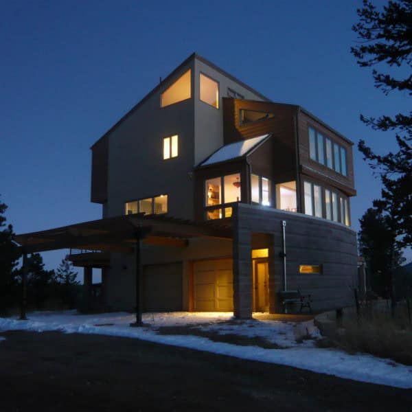 complete a trendy wood exterior with a simple carport design that is timeless