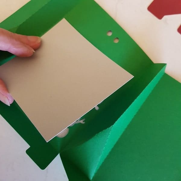 Glue the insert over the window area of the Christmas Gift Box