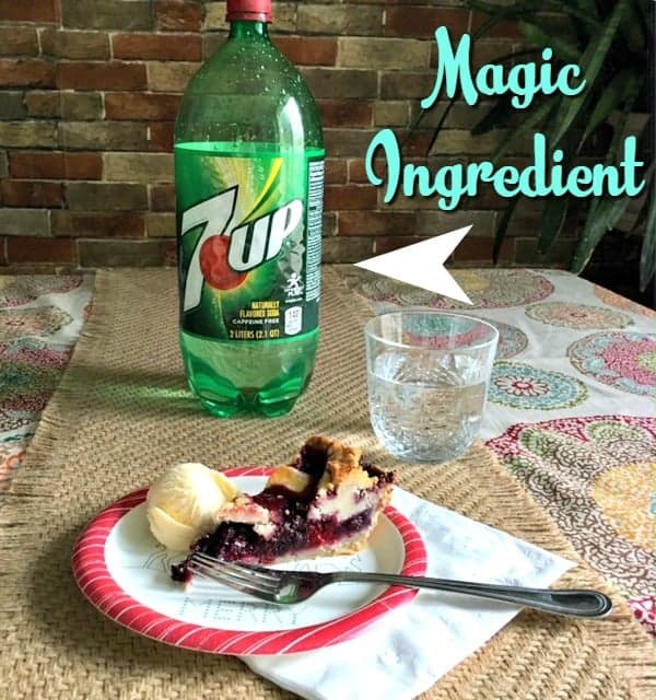 triple berry pie with bottle of 7 up for the pie crust