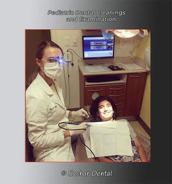 Sachar Dental NYC Hygienist with patient Teeth Cleaning NYC - Sachar Dental NYC