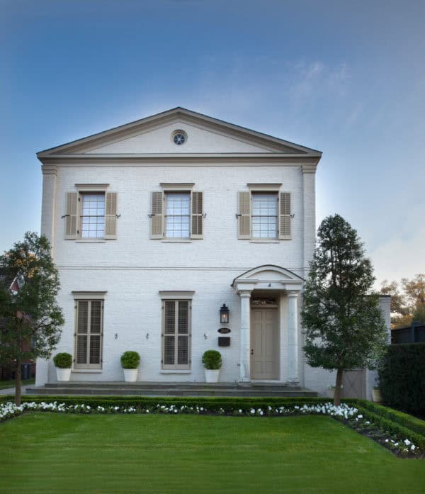 tan front door for a subtly tan house to evoke the clean traditional look