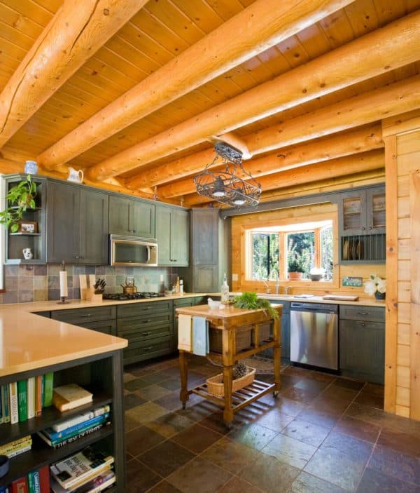 combine farmhouse and industrial vibes for a unique and eclectic kitchen with bay window