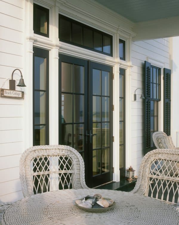 go for a classic and glamorous look using black glass doors and clean white trim