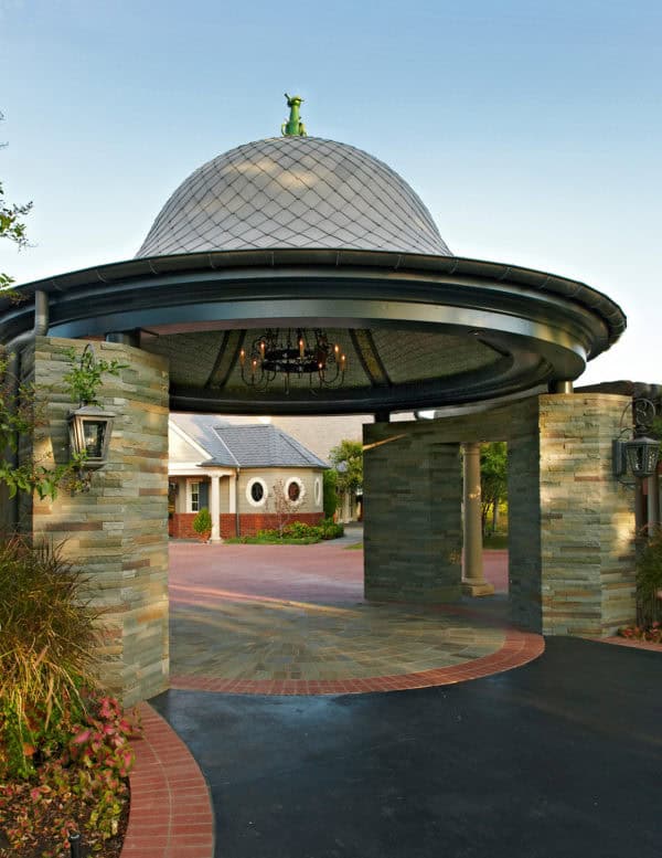 create a domed carport with chandelier in front of the main house for an eccentric look