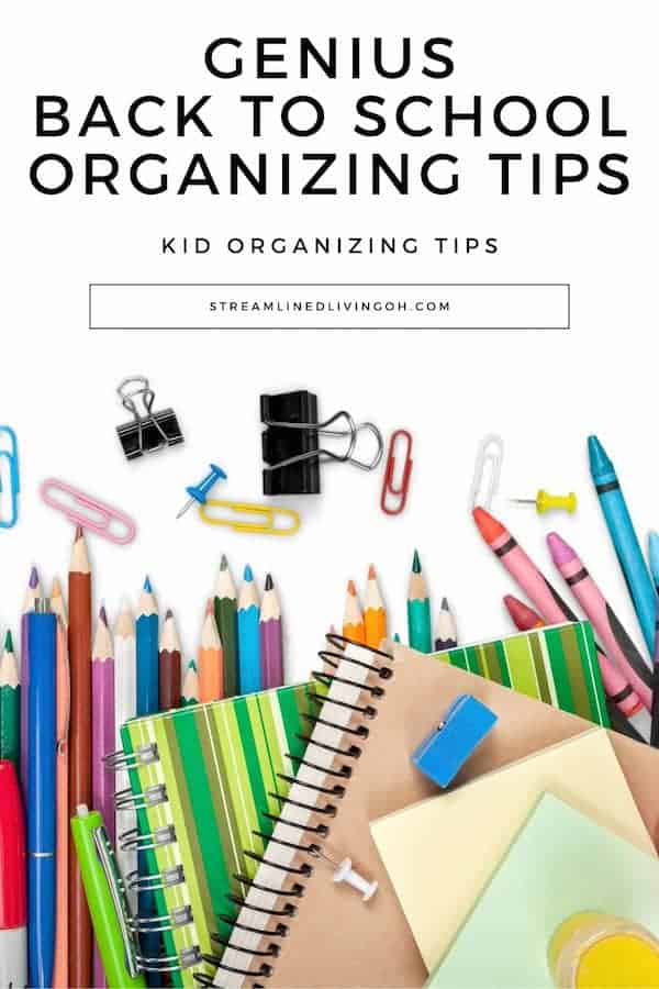 scattered colorful school supplies on white desktop