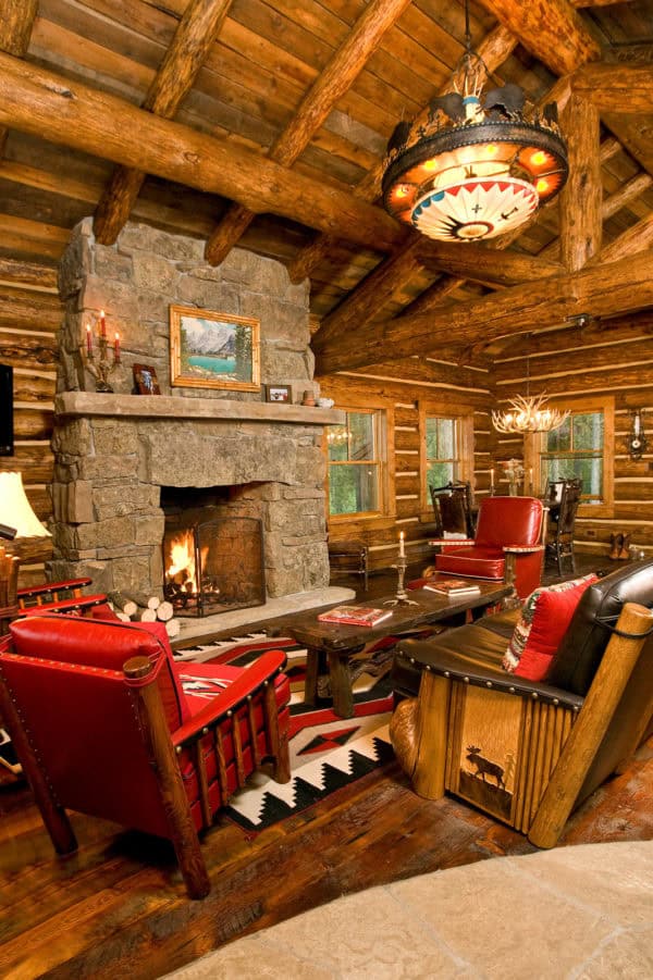 mix red leather with natural wood in log cabin living room tones for a rustic feel