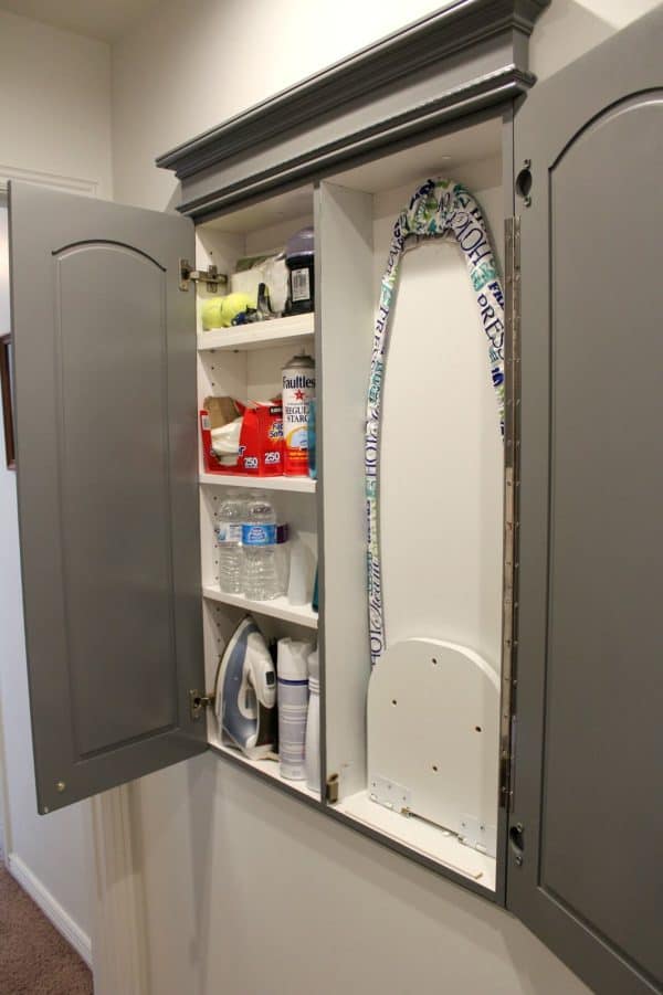 this genius recessed wall cabinet between studs hide your laundry room