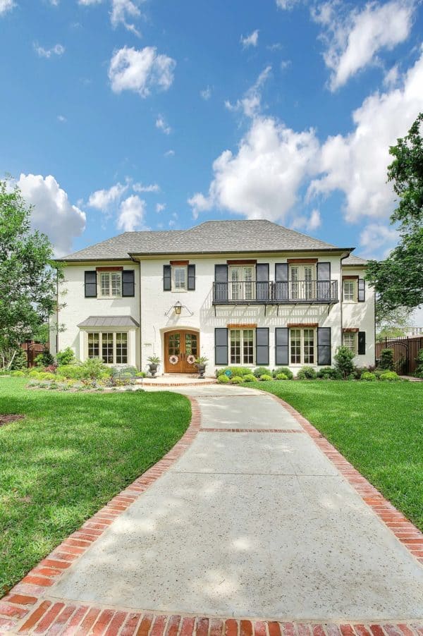 consider a green black shutter color on crisp white house for the best stucco exterior