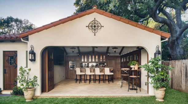 the home bar inside the shed looks cozy with its wood domination