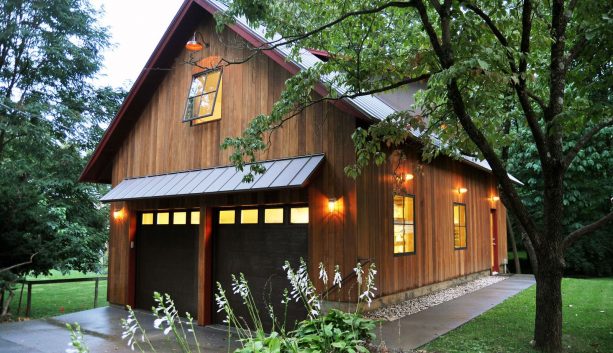 rustic garage apartment idea with black metal door