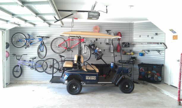 functional slat wall covering for a garage as extra storage