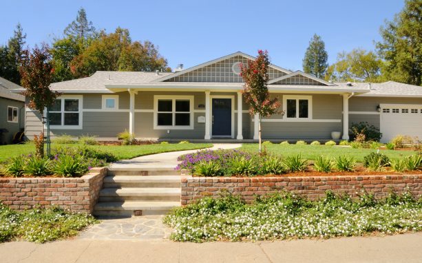 dark gray wall with white trim in a classic ranch house exterior