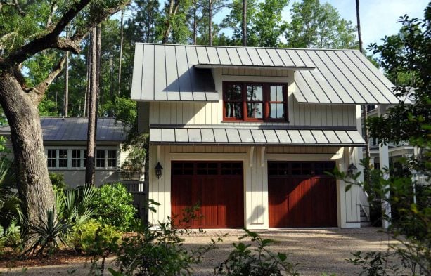 large traditional detached garage apartment with metal roof