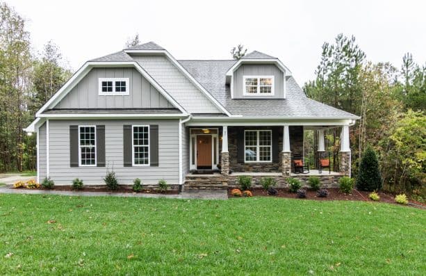 simple but eye-catching white house gray shutters