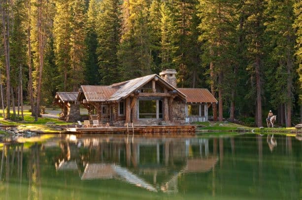 standing seam metal roof in patina finish for a log cabin