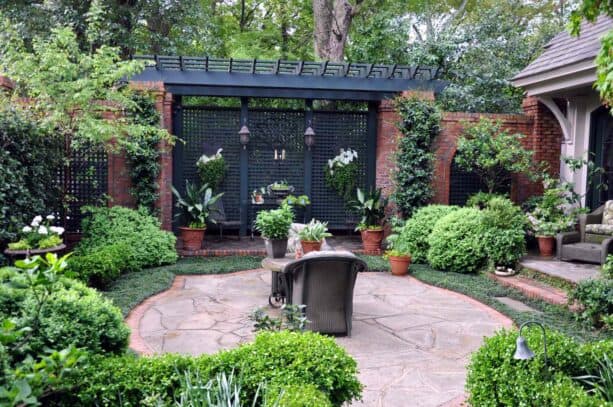 the idea of using a lattice trellis as a patio wall