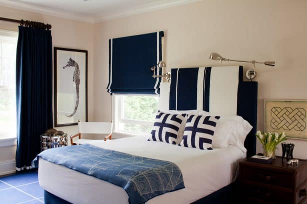 bedroom with navy blue, white, and beige color scheme