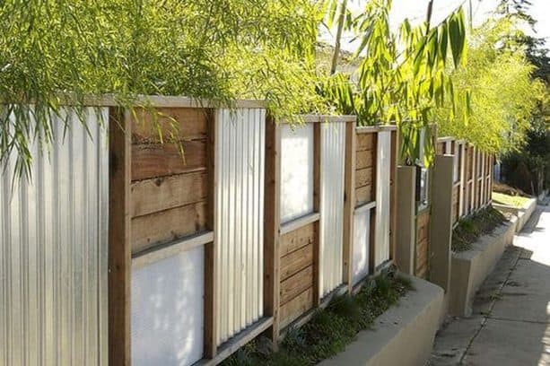 combination of corrugated metal and pallet for fencing