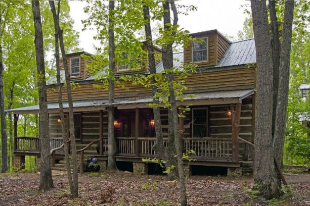 rustic wood porch railing in a log cabin