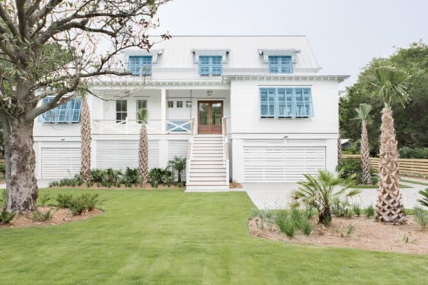 high-profile white house with blue shutters decoration