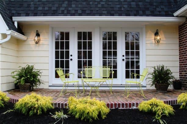 bright and elegant brick patio in a front yard idea