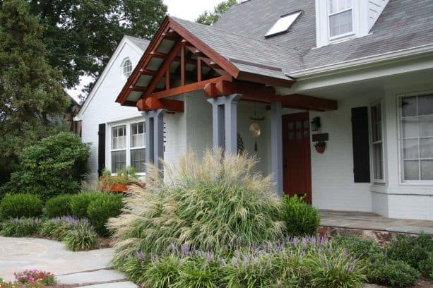 arts and crafts front door portico with a hip roof in a geometric pattern