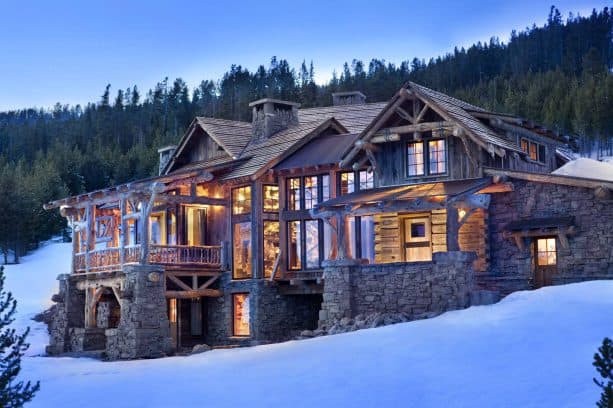 cedar shingles and corrugated cor-ten steel log cabin roof in a rustic style