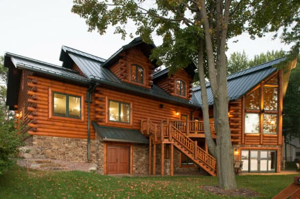 a large exterior looks extravagant with polished wooden rustic window trims